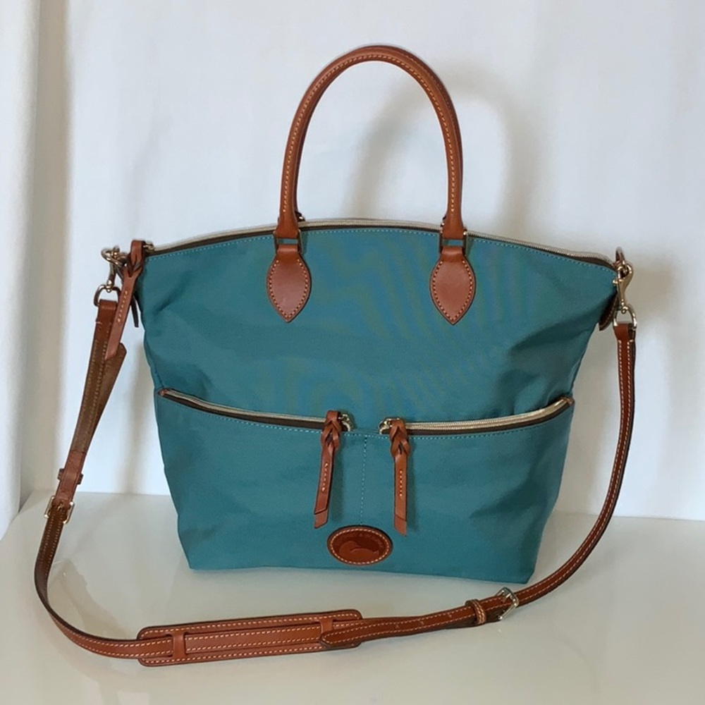 Think Spring with this gorgeous Dooney & Bourke Nylon Large Pocket Satchel! 💐